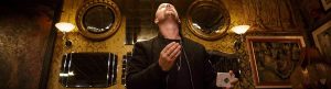 Award winning close up magician Parker looking upwards